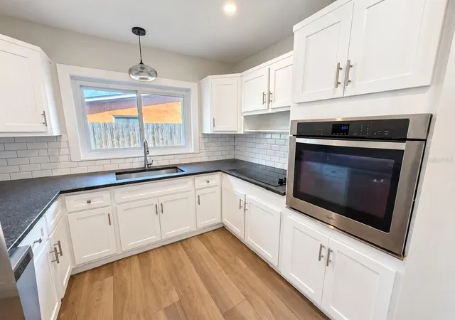 Photo 4 of Single family home for sale at 1450 Carolyn Ln, Clearwater, FL 33755 | MLS# TB8550459 | Listing updated on 2026-09-23