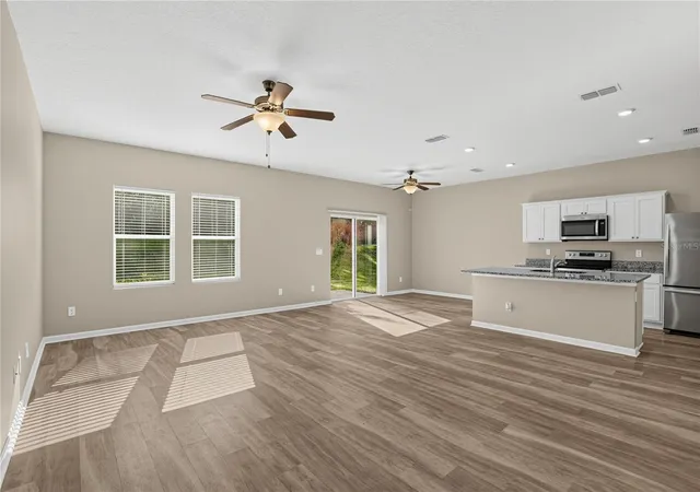 Photo 4 of Single family home for sale at 1033 Cades Cvs Way, Deland, FL 32720 | MLS# TB8550473 | Listing updated on 2026-09-26