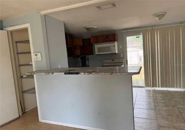 Photo 4 of Single family home for sale at 3801 Argon Dr, Tampa, FL 33619 | MLS# TB8550477 | Listing updated on 2026-09-21