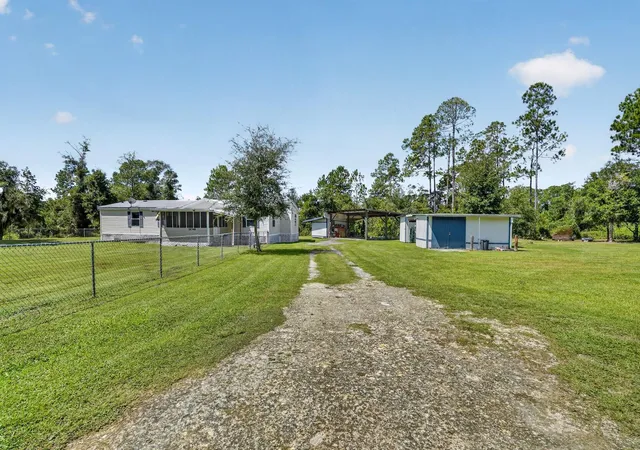 Photo 3 of Manufactured home for sale at 18748 NE 148th Terrace Rd, Fort Mc Coy, FL 32134 | MLS# OM732608 | Listing updated on 2026-09-23