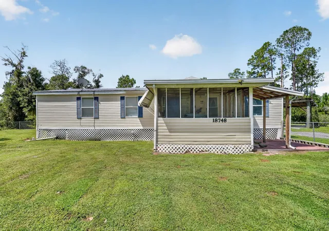 Photo 4 of Manufactured home for sale at 18748 NE 148th Terrace Rd, Fort Mc Coy, FL 32134 | MLS# OM732608 | Listing updated on 2026-09-23