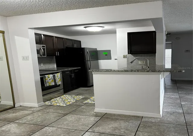 Photo 4 of Condo for sale at 3854 Galley Ct #101, Kissimmee, FL 34741 | MLS# O6443431 | Listing updated on 2026-09-20