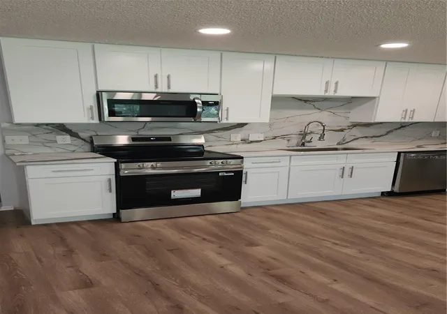 Photo 3 of Condo for sale at 2229 Americus Blvd W #7, Clearwater, FL 33763 | MLS# TB8550510 | Listing updated on 2026-09-30