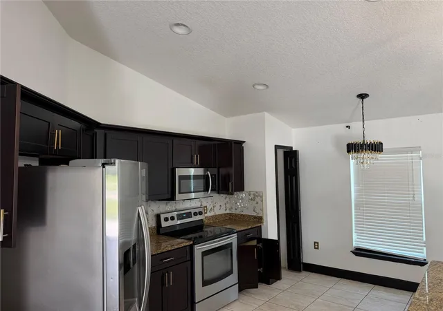 Photo 4 of Single family home for sale at 4 Willow Ln, Kissimmee, FL 34759 | MLS# O6443435 | Listing updated on 2026-10-03