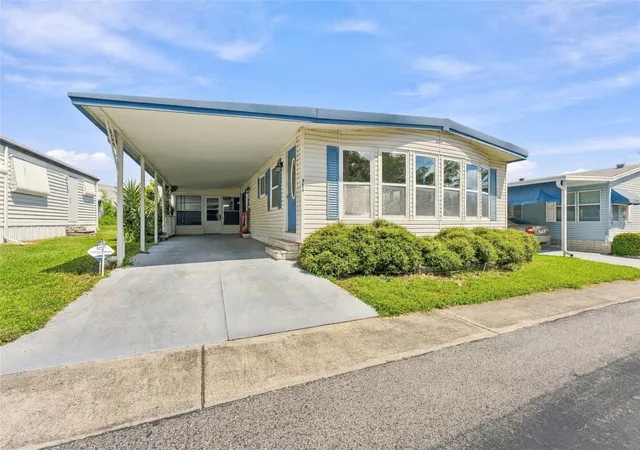 Photo 2 of Manufactured home for sale at 764 Royal Palm Cir #764, Largo, FL 33778 | MLS# TB8550537 | Listing updated on 2026-09-23