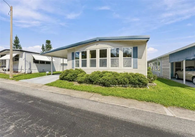Photo 3 of Manufactured home for sale at 764 Royal Palm Cir #764, Largo, FL 33778 | MLS# TB8550537 | Listing updated on 2026-09-23