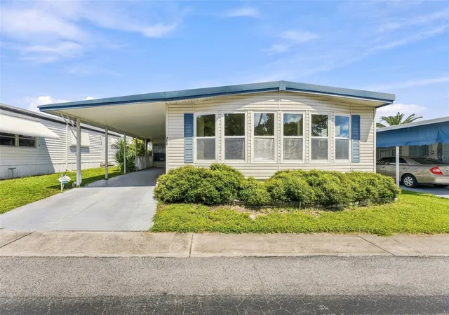 Photo 3 of Manufactured home for sale at 764 Royal Palm Cir #764, Largo, FL 33778 | MLS# TB8550537 | Listing updated on 2026-09-23