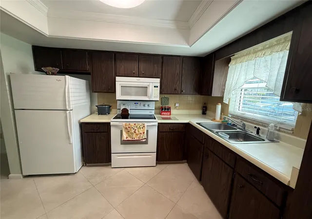 Photo 1 of House for sale at 1411 Normandy Park Dr #4, Clearwater, FL 33756 | MLS# TB8550538 | Listing updated on 2026-09-21