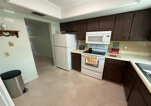 Photo 3 of House for sale at 1411 Normandy Park Dr #4, Clearwater, FL 33756 | MLS# TB8550538 | Listing updated on 2026-09-21