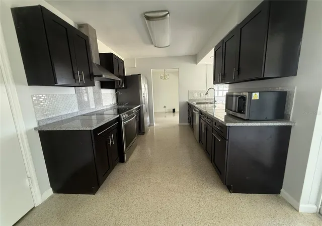 Photo 2 of Single family home for sale at 1750 Great Brikhill Rd, Clearwater, FL 33755 | MLS# O6443490 | Listing updated on 2026-09-22