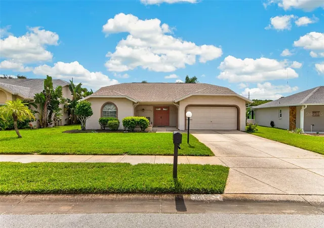 Photo 3 of Single family home for sale at 10707 Fallen Leaf Ln, Port Richey, FL 34668 | MLS# TB8550609 | Listing updated on 2026-09-21