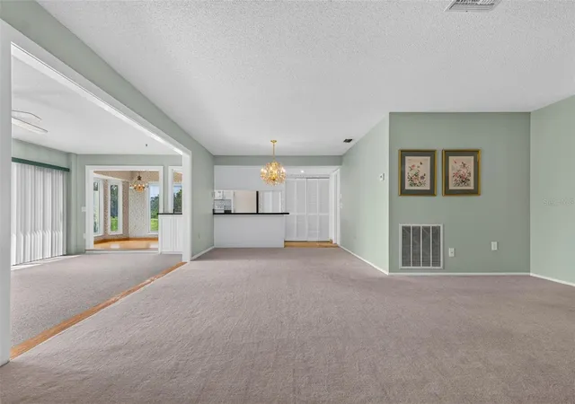 Photo 4 of Single family home for sale at 10707 Fallen Leaf Ln, Port Richey, FL 34668 | MLS# TB8550609 | Listing updated on 2026-09-21