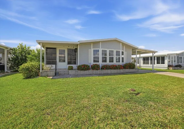 Photo 2 of Manufactured home for sale at 609 Iglesia Dr, North Port, FL 34287 | MLS# A4706829 | Listing updated on 2026-10-03