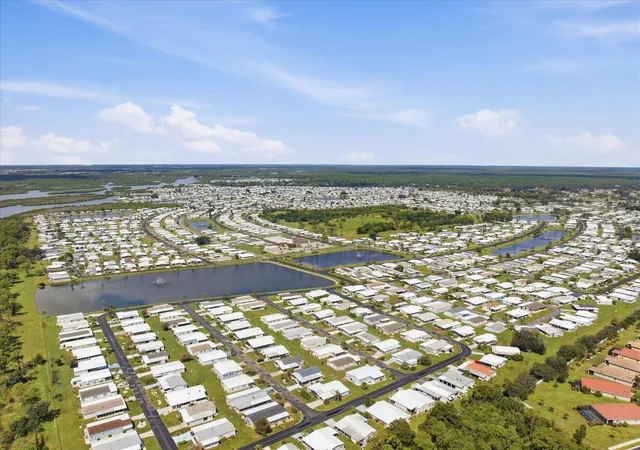 Photo 3 of Manufactured home for sale at 609 Iglesia Dr, North Port, FL 34287 | MLS# A4706829 | Listing updated on 2026-10-03