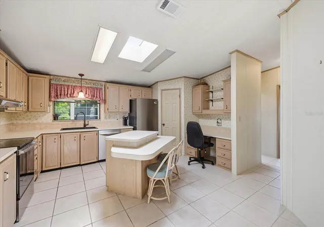 Photo 3 of Manufactured home for sale at 609 Iglesia Dr, North Port, FL 34287 | MLS# A4706829 | Listing updated on 2026-10-03