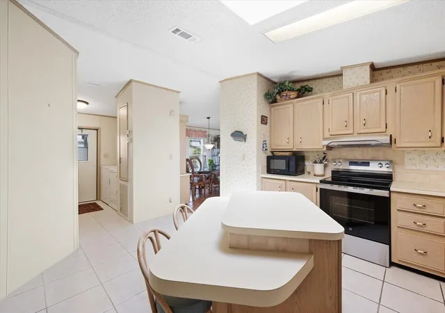 Photo 4 of Manufactured home for sale at 609 Iglesia Dr, North Port, FL 34287 | MLS# A4706829 | Listing updated on 2026-10-03
