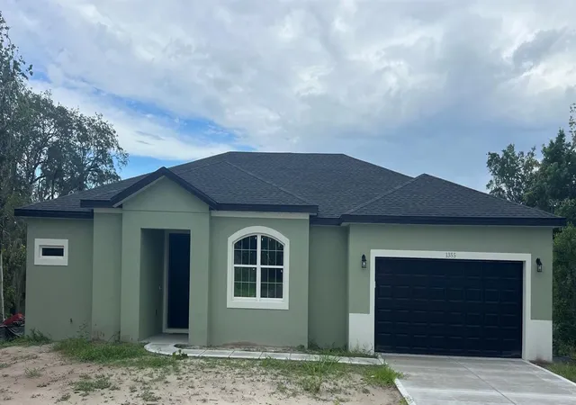 Photo 1 of Single family home for sale at 1355 W Hartley Cir, Deltona, FL 32725 | MLS# O6443505 | Listing updated on 2026-10-05