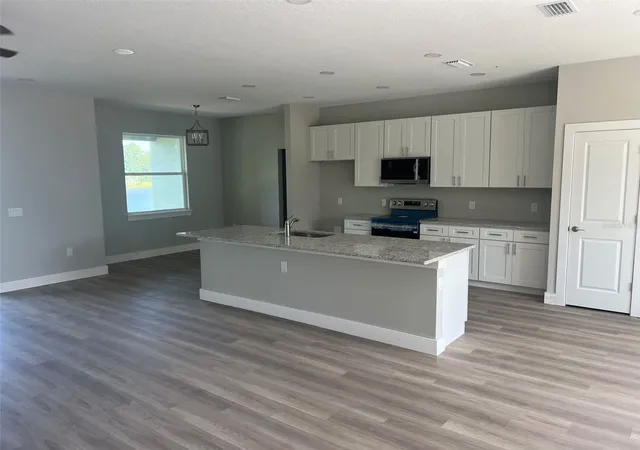Photo 3 of Single family home for sale at 1355 W Hartley Cir, Deltona, FL 32725 | MLS# O6443505 | Listing updated on 2026-10-05