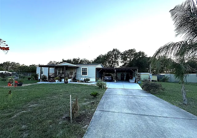 Photo 1 of Manufactured home for sale at 9049 Burr Dr, Polk City, FL 33868 | MLS# S5157988 | Listing updated on 2026-09-28