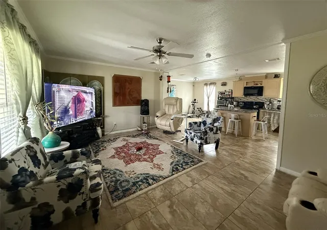 Photo 3 of Manufactured home for sale at 9049 Burr Dr, Polk City, FL 33868 | MLS# S5157988 | Listing updated on 2026-09-28