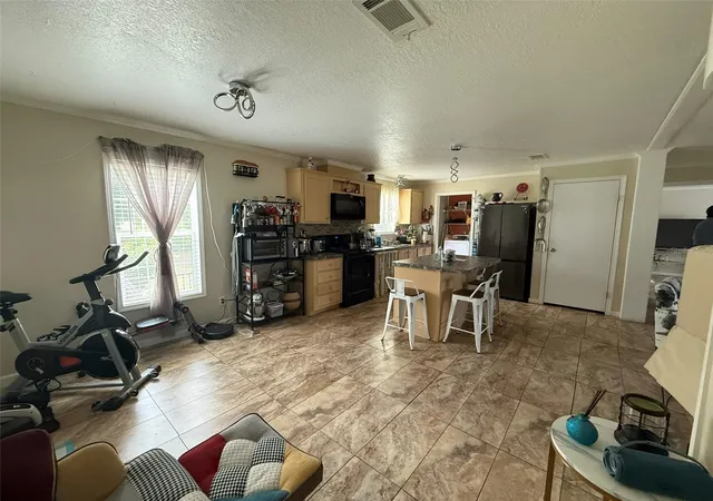 Photo 3 of Manufactured home for sale at 9049 Burr Dr, Polk City, FL 33868 | MLS# S5157988 | Listing updated on 2026-09-28