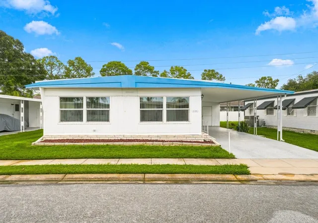 Photo 2 of Manufactured home for sale at 1100 Belcher Rd S #20, Largo, FL 33771 | MLS# TB8550640 | Listing updated on 2026-10-02