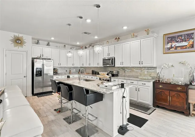 Photo 3 of Single family home for sale at 944 Old Windsor Way, Spring Hill, FL 34609 | MLS# TB8550657 | Listing updated on 2026-09-24