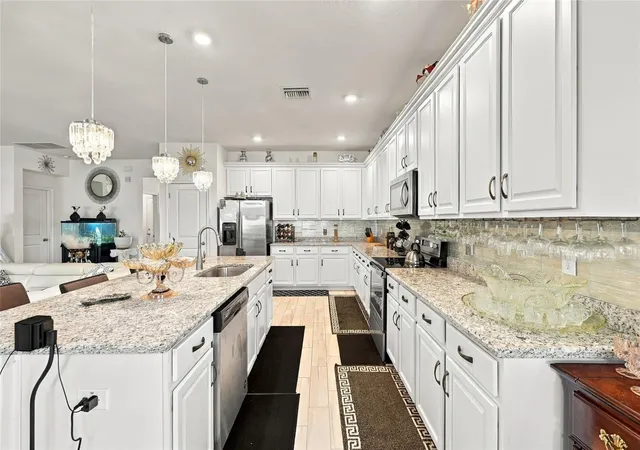 Photo 3 of Single family home for sale at 944 Old Windsor Way, Spring Hill, FL 34609 | MLS# TB8550657 | Listing updated on 2026-09-24