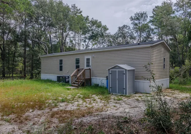 Photo 3 of Manufactured home for sale at 23778 NE 113th Avenue, Fort Mc Coy, FL 32134 | MLS# A4706841 | Listing updated on 2026-09-22