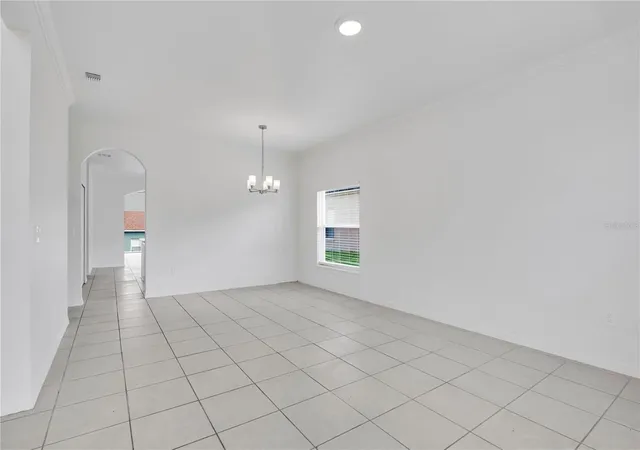 Photo 3 of Single family home for sale at 7713 Rex Hl Trl, Orlando, FL 32818 | MLS# O6443524 | Listing updated on 2026-10-01