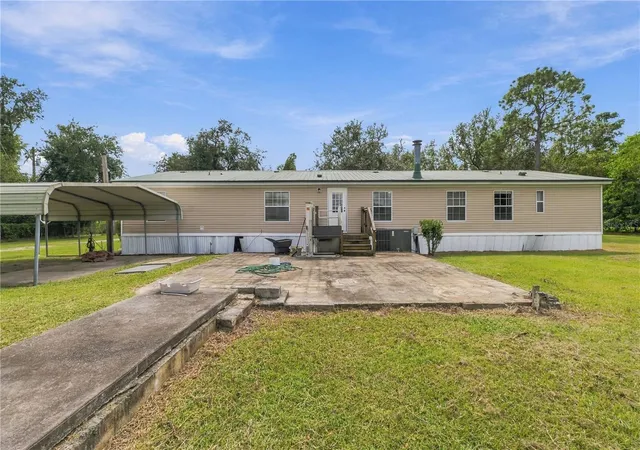 Photo 1 of Manufactured home for sale at 8611 County Line Rd, Lithia, FL 33547 | MLS# TB8550666 | Listing updated on 2026-09-26