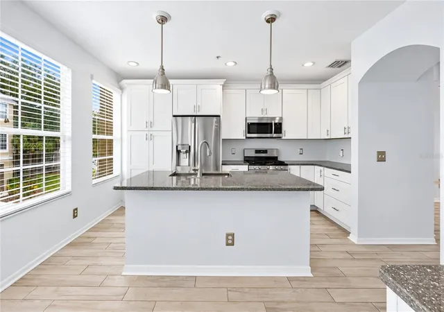 Photo 1 of Townhouse for sale at 3018 Bayshore Pointe Dr, Tampa, FL 33611 | MLS# A4706846 | Listing updated on 2026-10-04