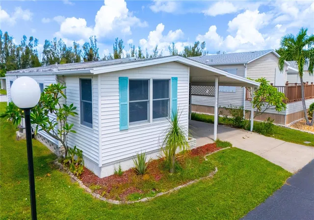 Photo 1 of Manufactured home for sale at 4300 Riverside Dr #152, Punta Gorda, FL 33982 | MLS# C7530998 | Listing updated on 2026-09-22