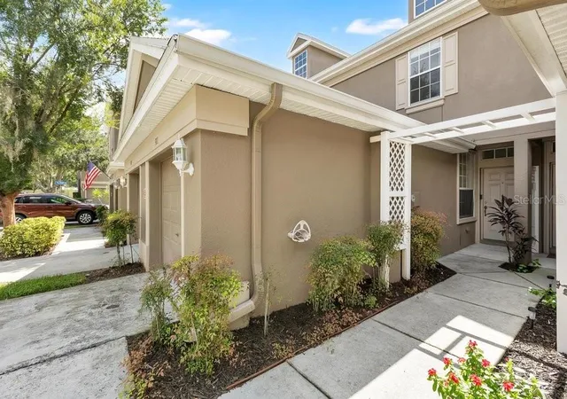 Photo 2 of Townhouse for sale at 9811 Fan Palm Way, Tampa, FL 33610 | MLS# O6443539 | Listing updated on 2026-09-21