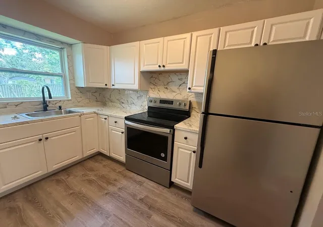 Photo 3 of Single family home for sale at 704 E Richmere St, Tampa, FL 33612 | MLS# TB8550688 | Listing updated on 2026-09-21