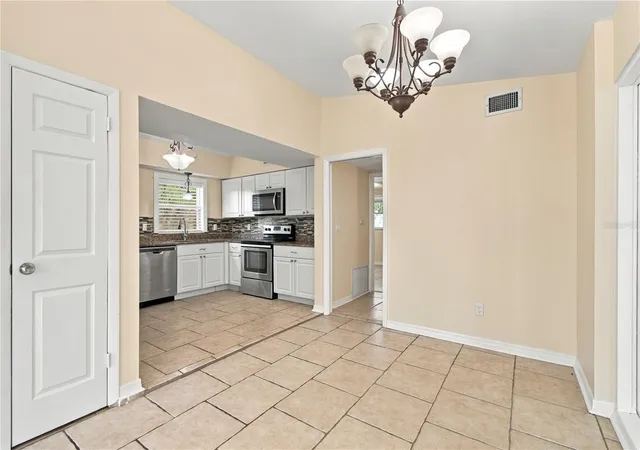 Photo 3 of Single family home for sale at 10312 Lake Carroll Way, Tampa, FL 33618 | MLS# TB8550690 | Listing updated on 2026-10-23