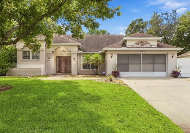 Photo 1 of Single family home for sale at 8088 Spanish Oak Dr, Spring Hill, FL 34606 | MLS# W7889688 | Listing updated on 2026-10-18