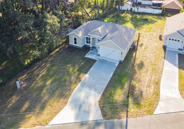 Single family home for sale at 12428 SE 72 Avenue, BELLEVIEW, FL 34420 | MLS# OM732645