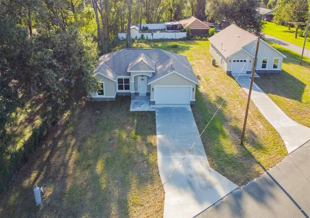 Photo 2 of Single family home for sale at 12428 Se 72 Avenue, Belleview, FL 34420 | MLS# OM732645 | Listing updated on 2026-09-24