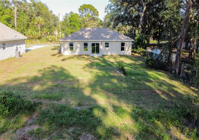 Photo 3 of Single family home for sale at 12428 SE 72 Avenue, Belleview, FL 34420 | MLS# OM732645 | Listing updated on 2026-09-26