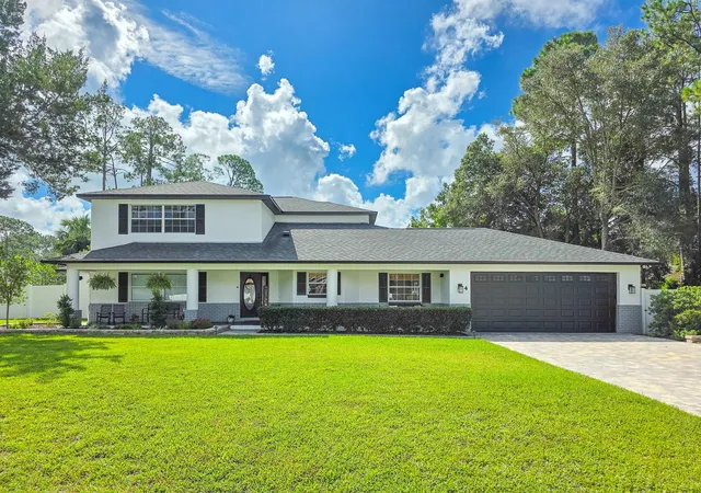 Photo 2 of Single family home for sale at 4 Burning Ember Ln, Palm Coast, FL 32137 | MLS# FC321601 | Listing updated on 2026-09-26