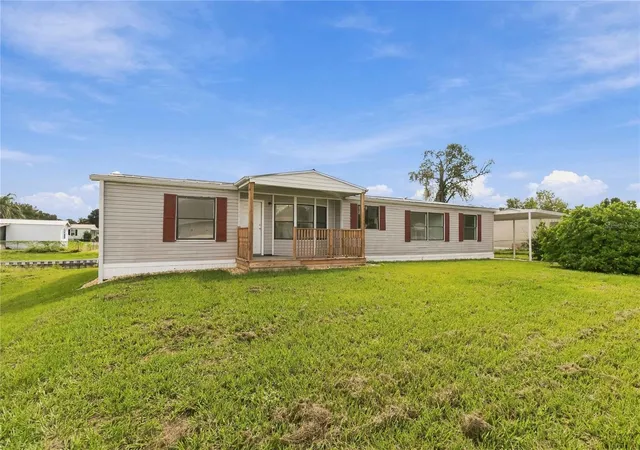 Photo 3 of Manufactured home for sale at 417 Lagoon Ct, Kenansville, FL 34739 | MLS# S5158024 | Listing updated on 2026-09-24