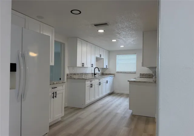 Photo 4 of Single family home for sale at 6810 El Camino Paloma St, Port Richey, FL 34668 | MLS# TB8550804 | Listing updated on 2026-09-21