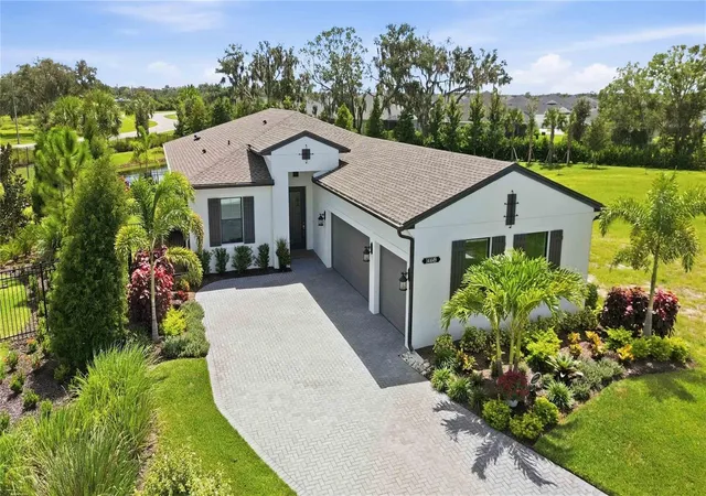 Photo 1 of Single family home for sale at 14449 Hammock Oak St, Parrish, FL 34219 | MLS# A4706899 | Listing updated on 2026-10-21