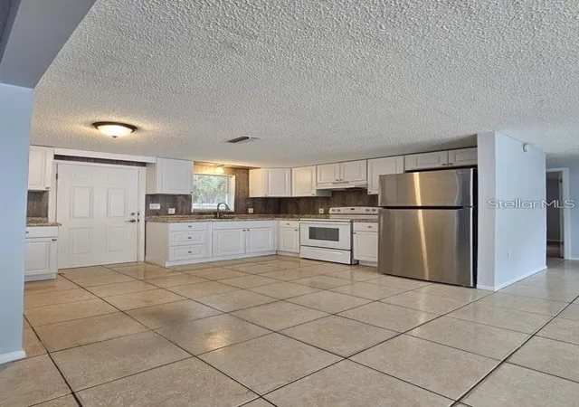 Photo 4 of Single family home for sale at 8337 Sunnydale Dr, Hudson, FL 34667 | MLS# TB8550821 | Listing updated on 2026-10-02