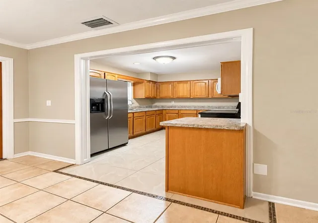 Photo 3 of Single family home for sale at 109 W Grapefruit Cir, Clearwater, FL 33759 | MLS# TB8550829 | Listing updated on 2026-09-22
