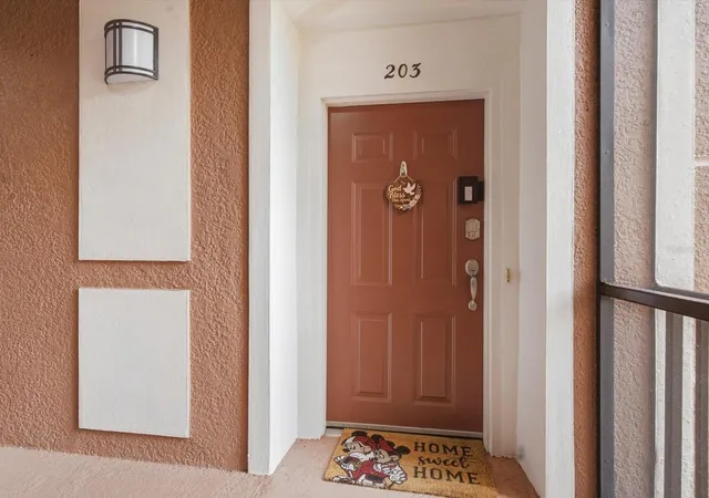 Photo 1 of Condo for sale at 8300 Portofino Dr #203, Davenport, FL 33896 | MLS# O6443652 | Listing updated on 2026-09-24