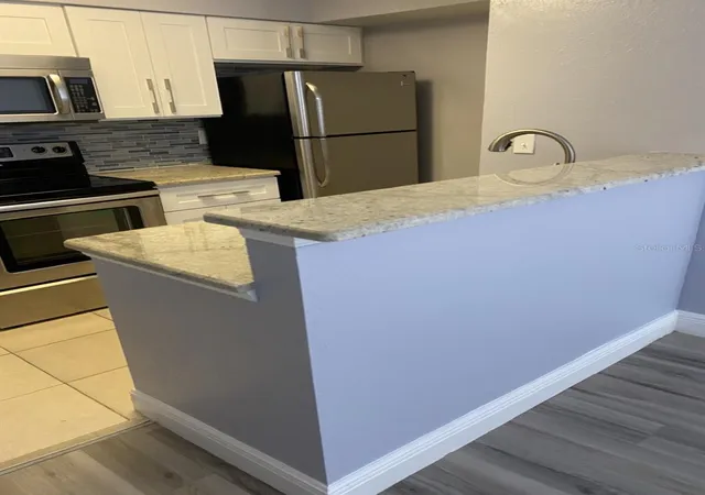 Listing Photo 5 - Condo for sale in building located at 5124 Park Central Dr, Orlando, FL 32839 - Unit #513