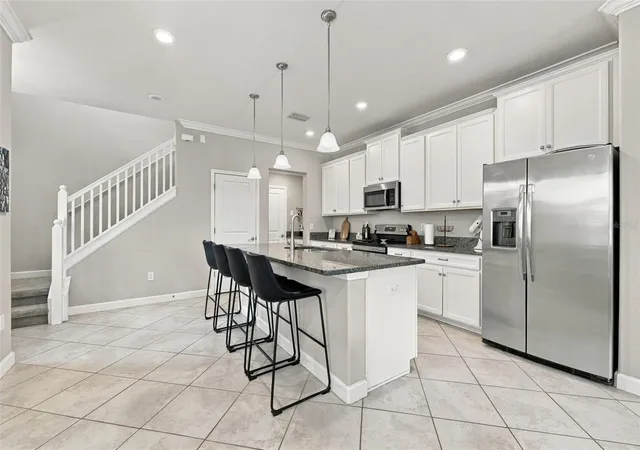 Photo 4 of Townhouse for sale at 6611 Rocky Park St, Tampa, FL 33625 | MLS# TB8550870 | Listing updated on 2026-09-24