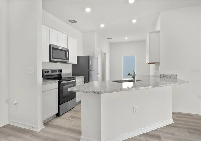 Photo 4 of Single family home for sale at 13230 Tula Loop, Astatula, FL 34705 | MLS# TB8550936 | Listing updated on 2026-10-07